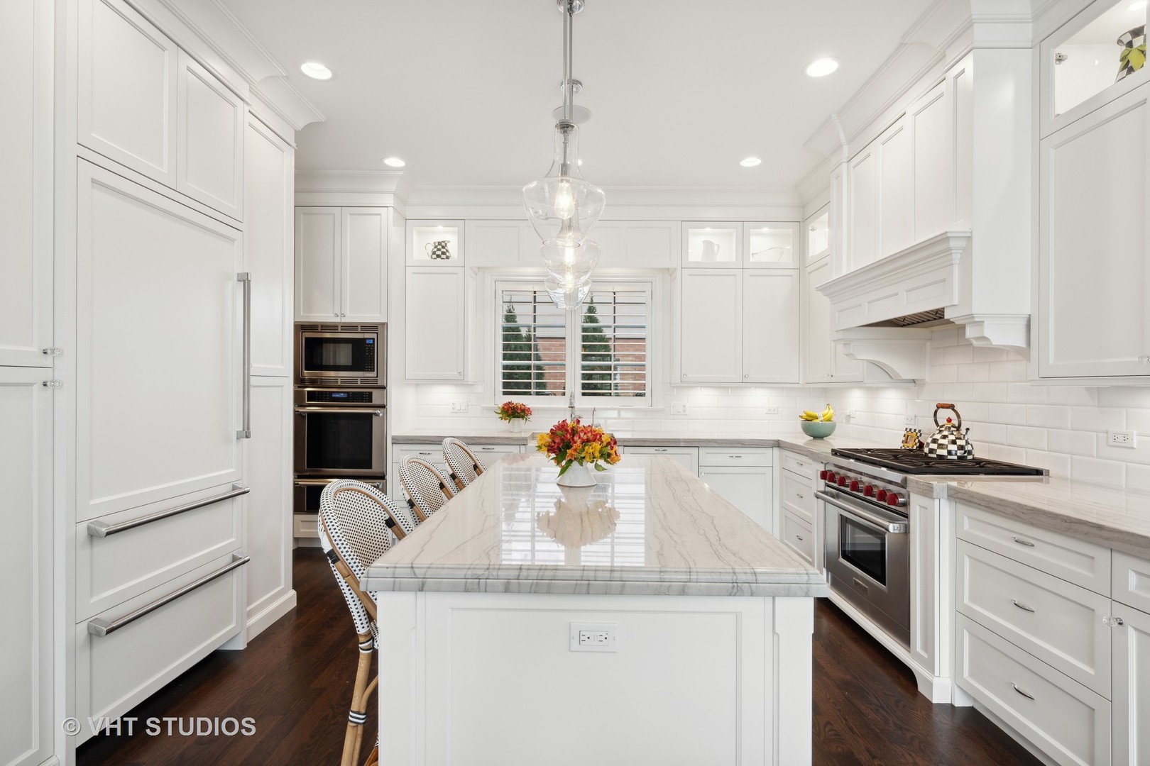 814 17th Street Wilmette, IL 60091 - Photo 9 of 51 a kitchen with stainless steel appliances granite countertop a sink stove and refrigerator