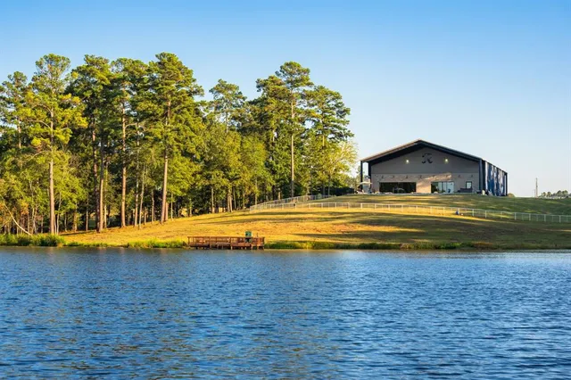 a view of swimming pool with an outdoor space and seating area