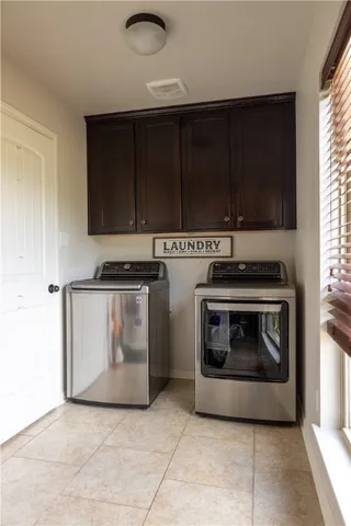 a kitchen with a stove and a microwave