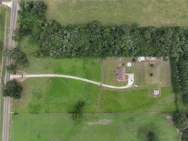 a view of a lake with a yard