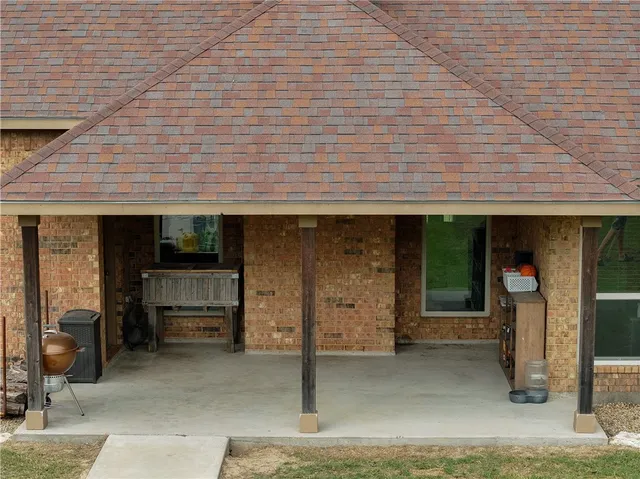 a house view with a backyard space