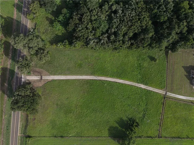 a living room with furniture and next to a window