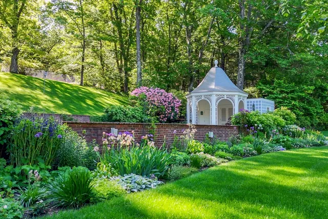 a house with garden in front of it