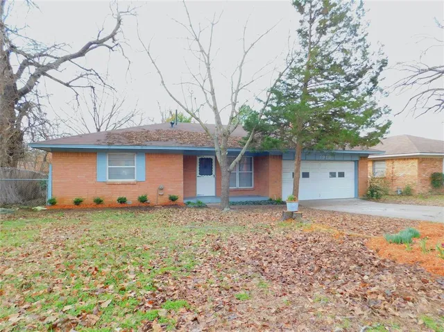 a house view with a backyard space