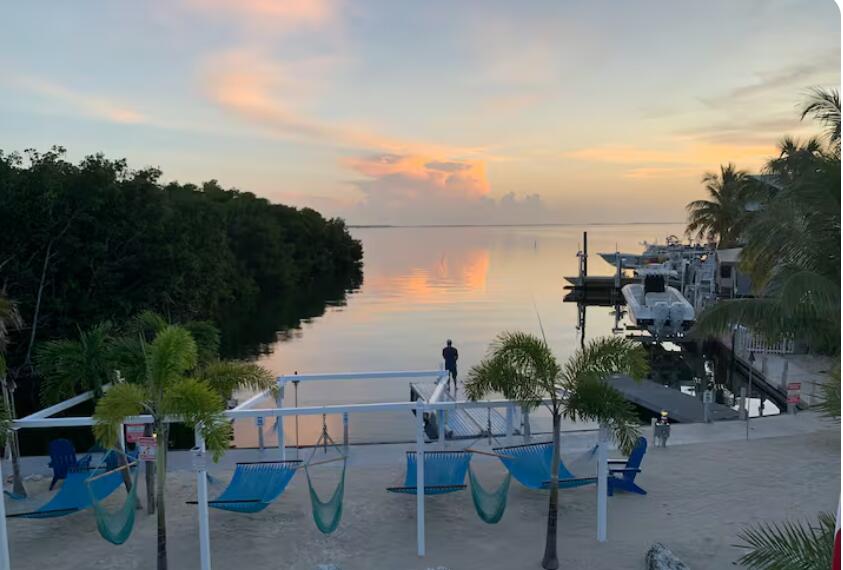 325 Calusa Street, Unit 121 Key Largo, FL 33037 - Photo 11 of 21 a view of a lake from balcony
