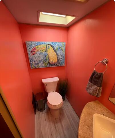 325 Calusa Street, Unit 121 Key Largo, FL 33037 - Photo 15 of 21 a bathroom with a toilet and a sink