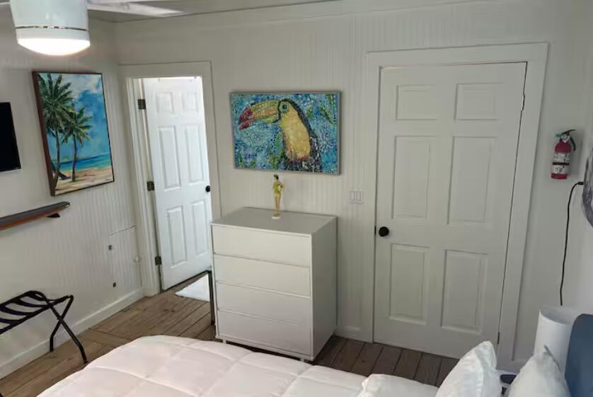 325 Calusa Street, Unit 121 Key Largo, FL 33037 - Photo 18 of 21 a bathroom with a sink a toilet and shower