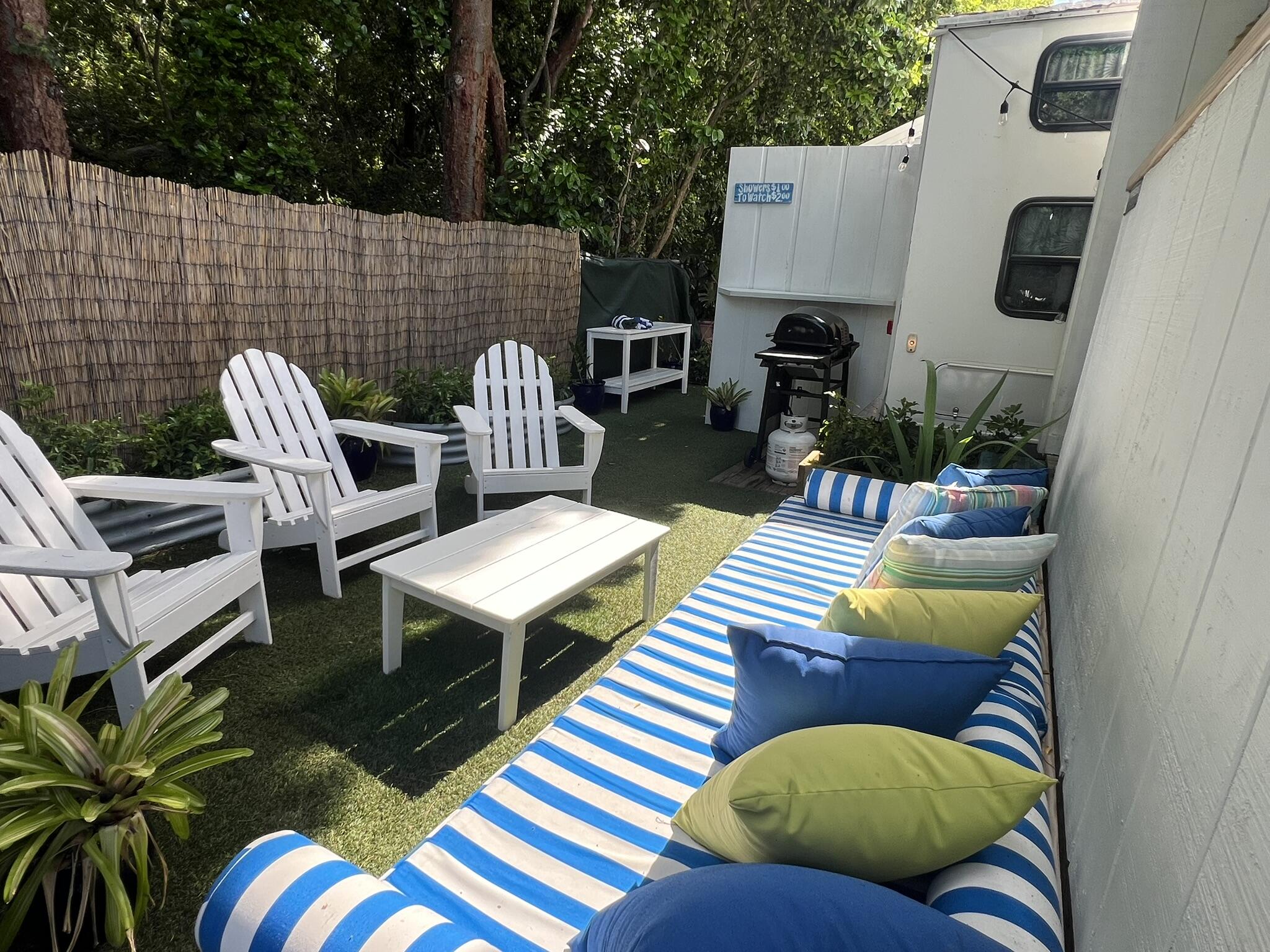 325 Calusa Street, Unit 121 Key Largo, FL 33037 - Photo 2 of 21 a view of a patio in the backyard