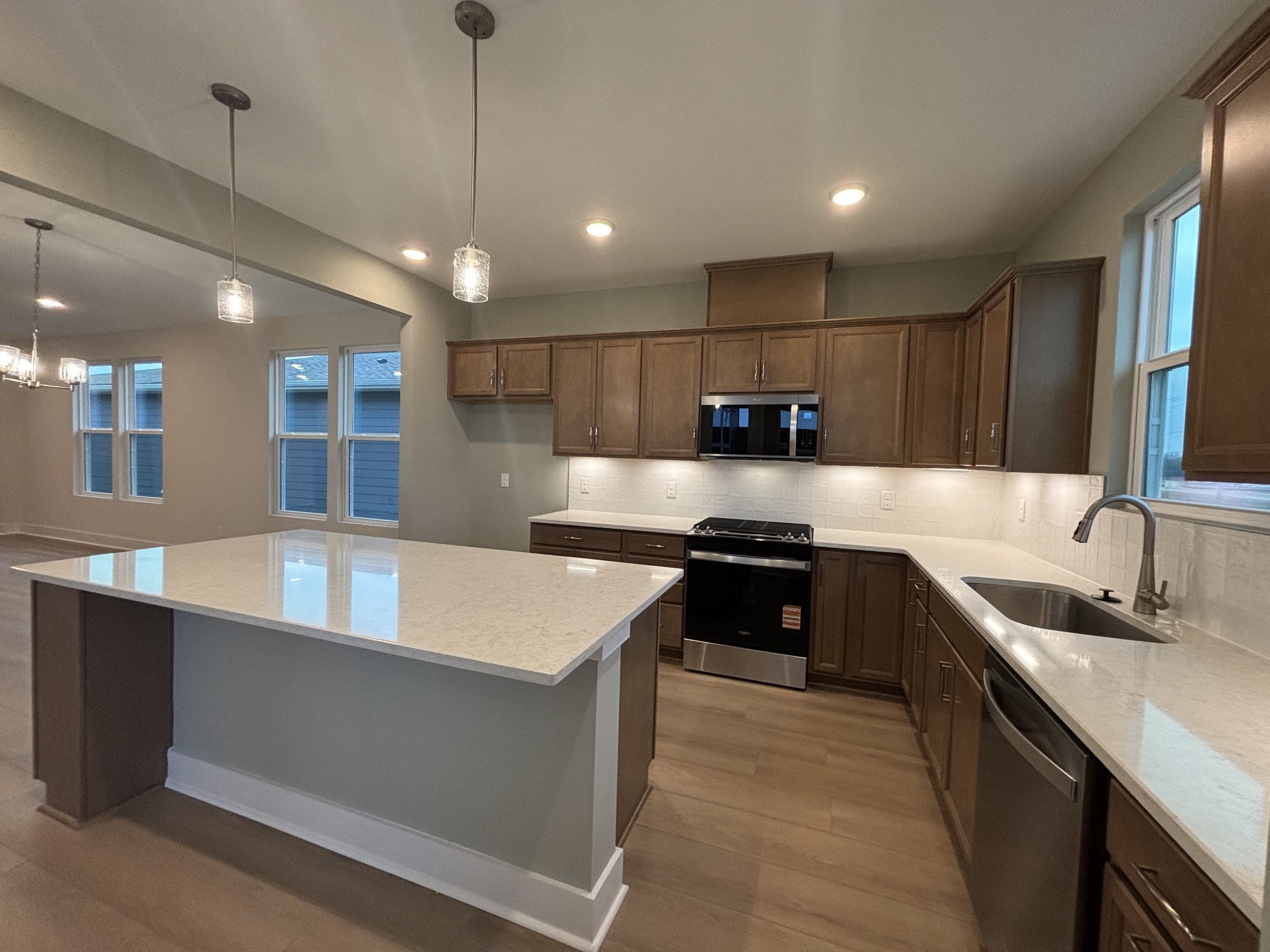 512 Scarlet Oak Road Lebanon, TN 37090 - Photo 1 of 26 a large kitchen with kitchen island a sink stainless steel appliances and a counter top space