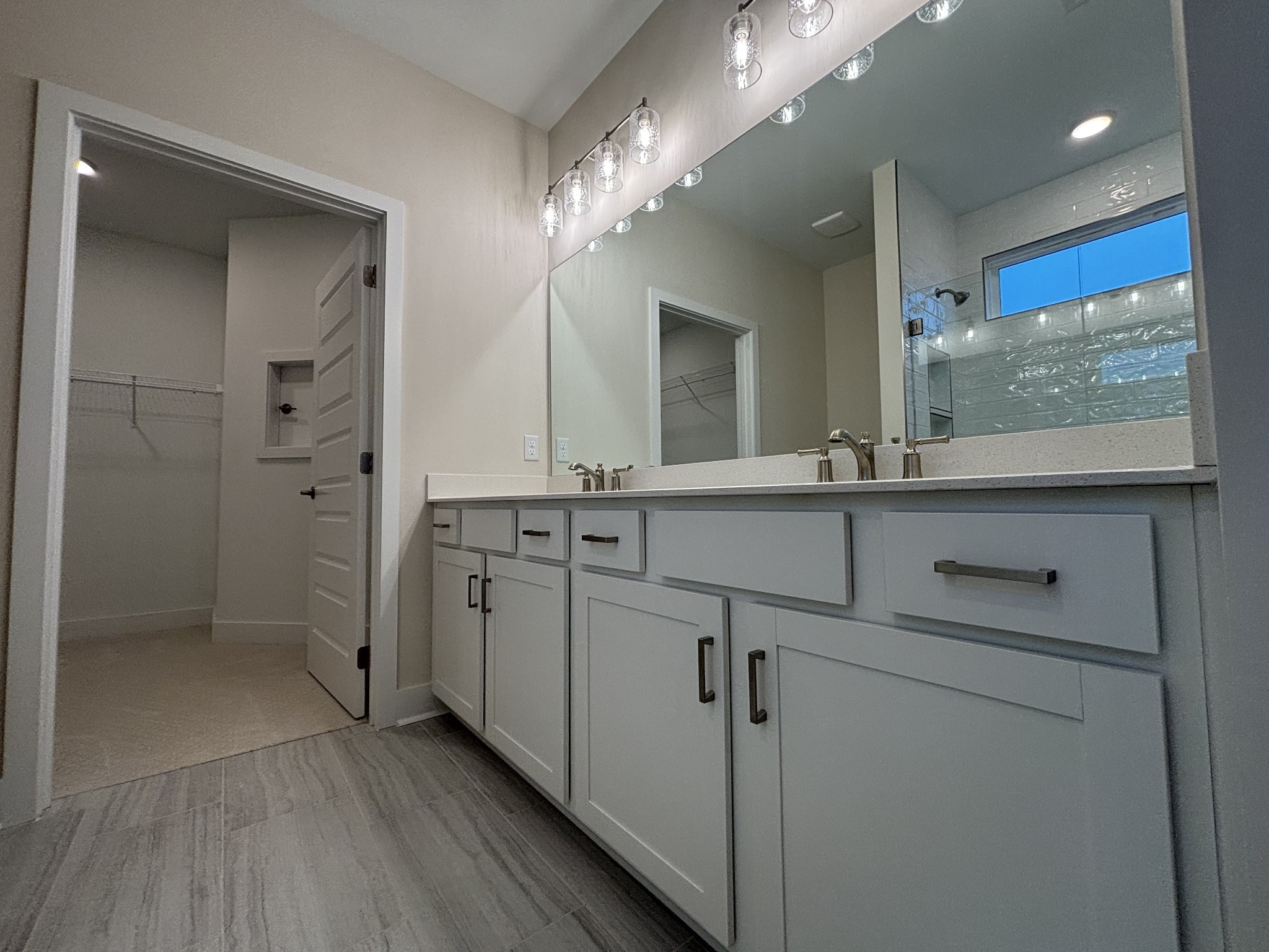 512 Scarlet Oak Road Lebanon, TN 37090 - Photo 13 of 26 a bathroom with a double vanity sink mirror and shower