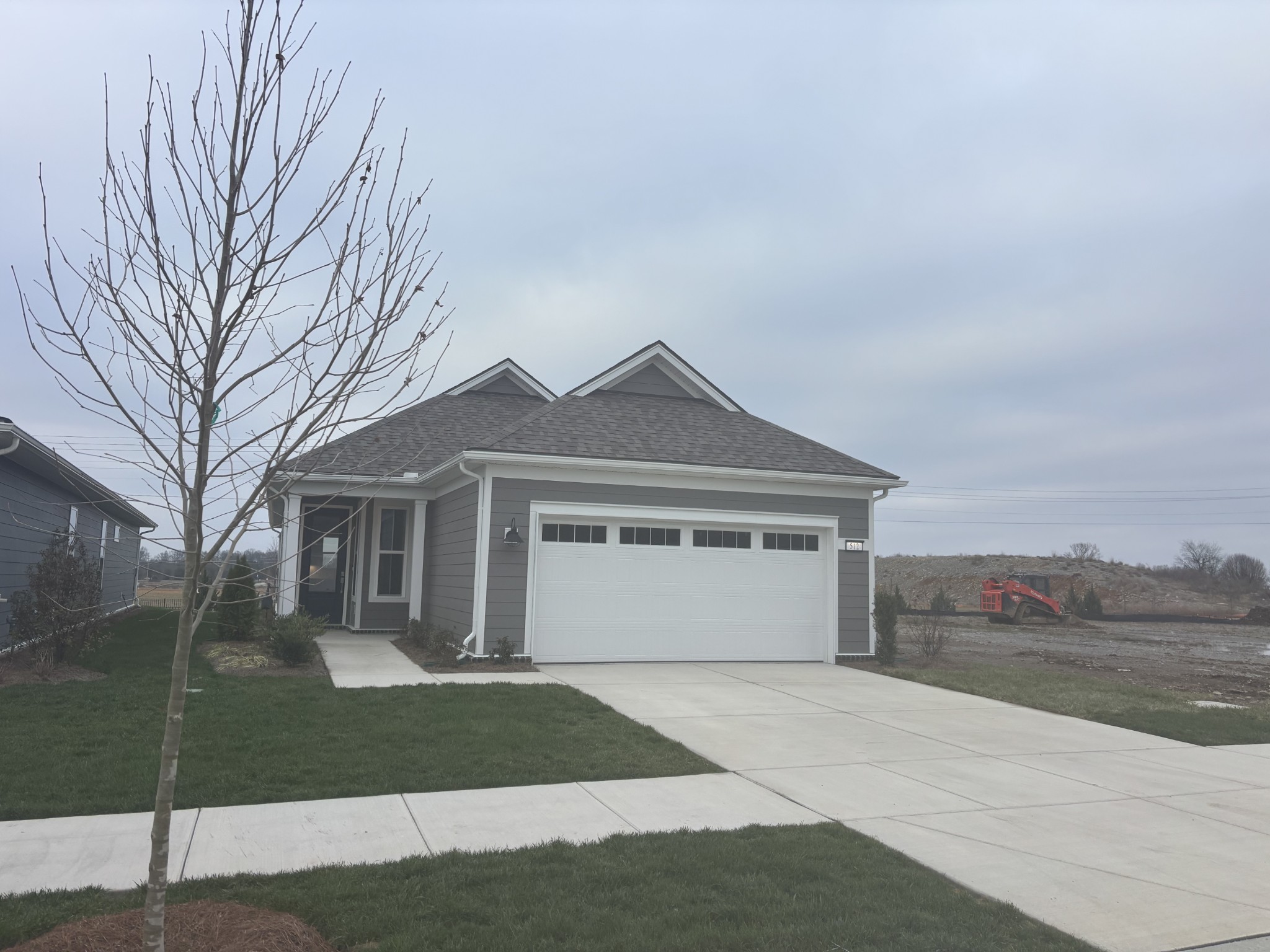512 Scarlet Oak Road Lebanon, TN 37090 - Photo 3 of 26 a front view of a house with a yard