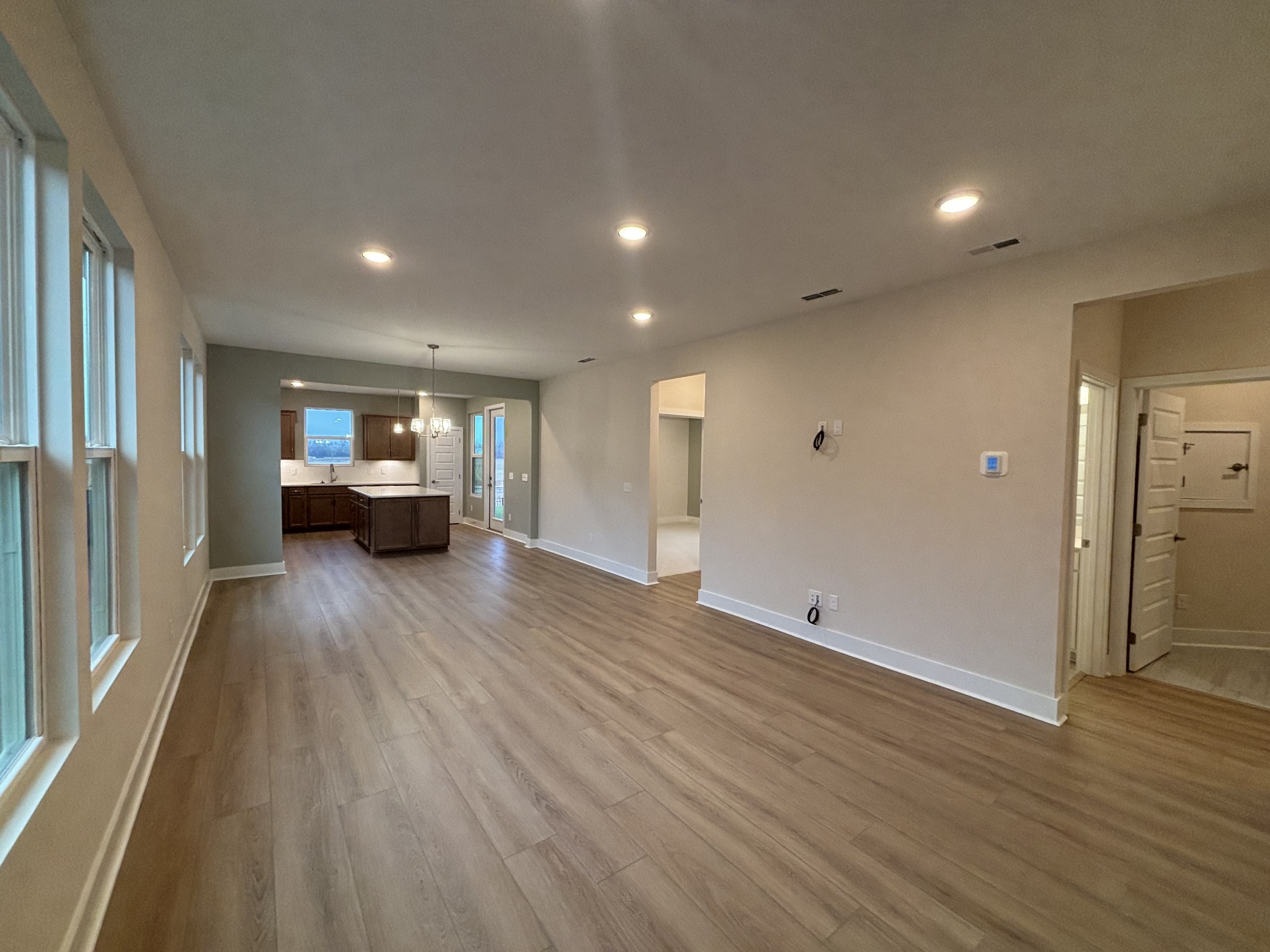 512 Scarlet Oak Road Lebanon, TN 37090 - Photo 5 of 26 a view of empty room with wooden floor and window
