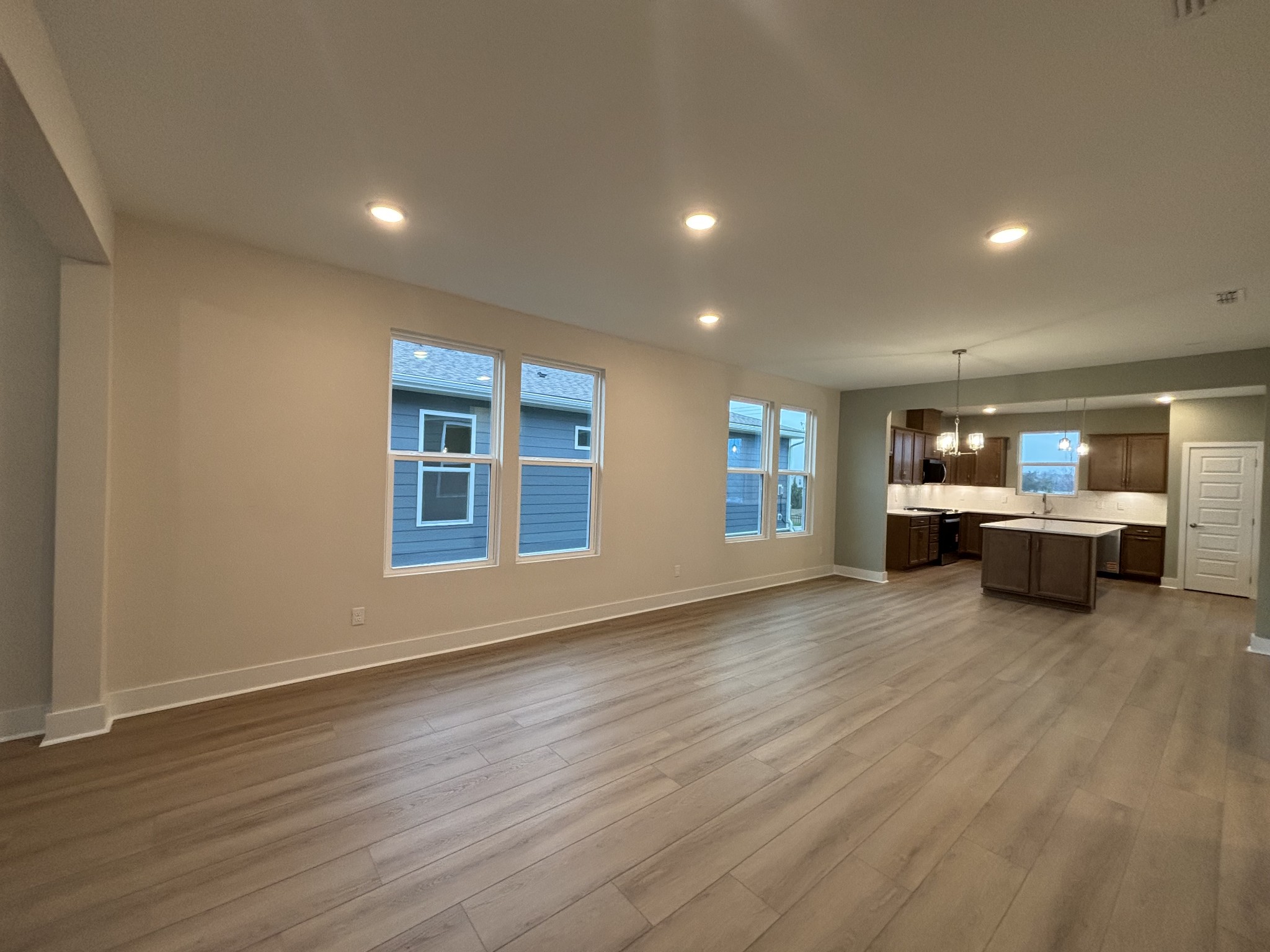 512 Scarlet Oak Road Lebanon, TN 37090 - Photo 6 of 26 a view of a big room with wooden floor and windows