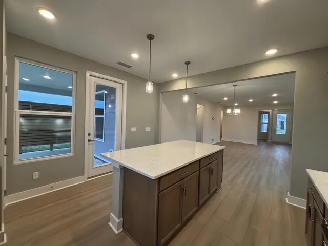 a bathroom with a double vanity sink mirror and shower