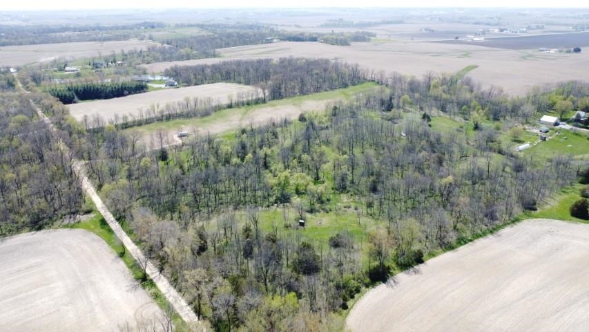 Tbd Miche Road Pearl City, IL 61062 - Photo 24 of 64 a view of a lake with a mountain and trees