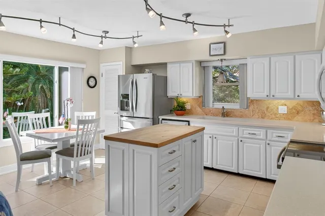 a view of a living room and a flat screen tv