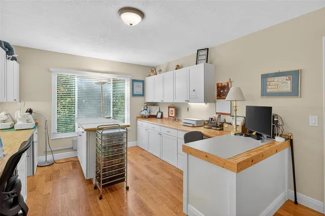 a bathroom with a toilet a sink and shower