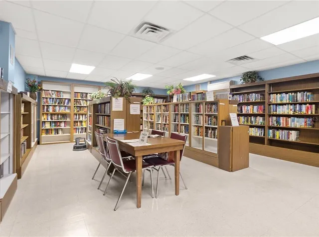 a view of a garden with an outdoor seating