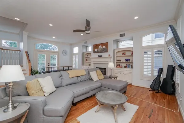 a bathroom with a shower and a glass door