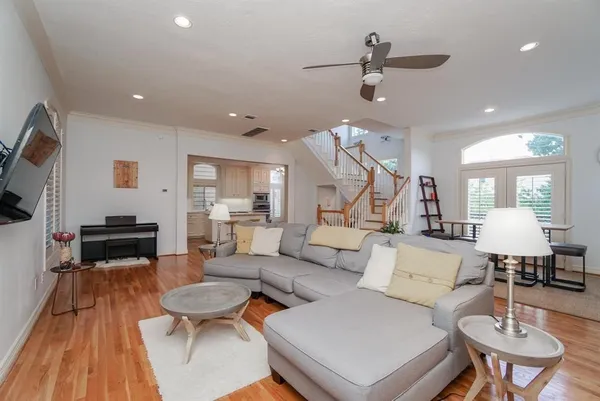 a view of an entryway with wooden floor