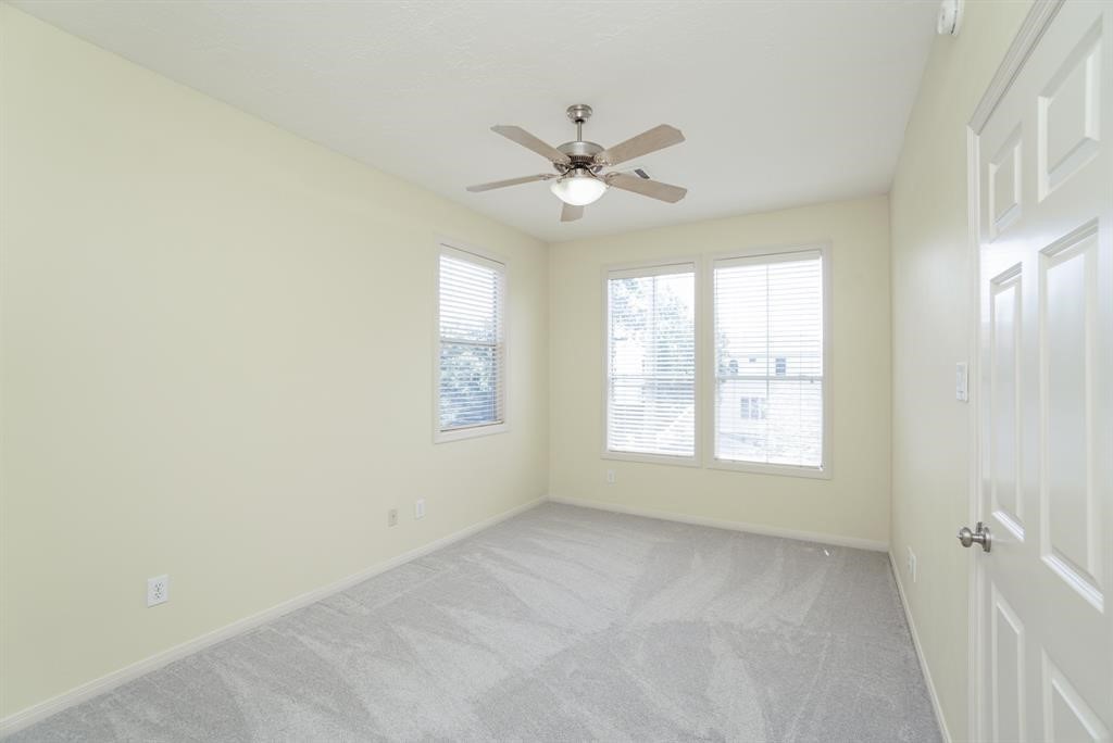4406 Feagan Street, Unit A Houston, TX 77007 - Photo 26 of 29 a view of an empty room with a window