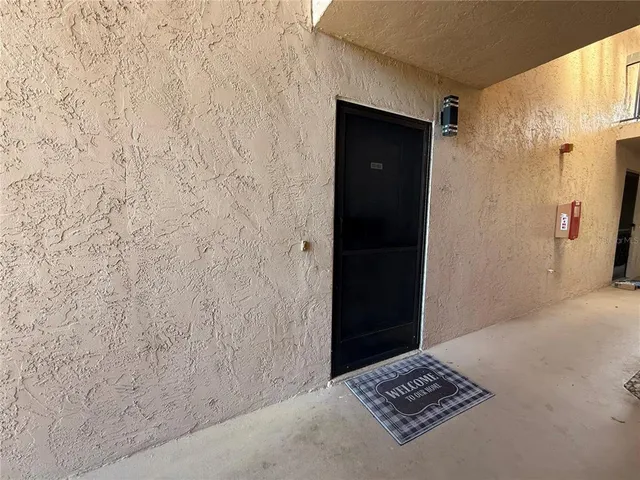a door view with a wooden door
