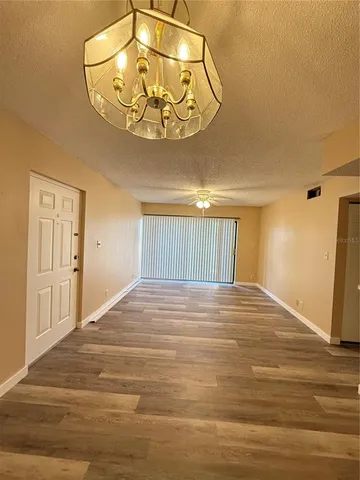 a view of a livingroom with a wooden floor