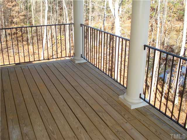 7021 Rippling Stone Lane Raleigh, NC 27612 - Photo 12 of 25 a view of wooden balcony