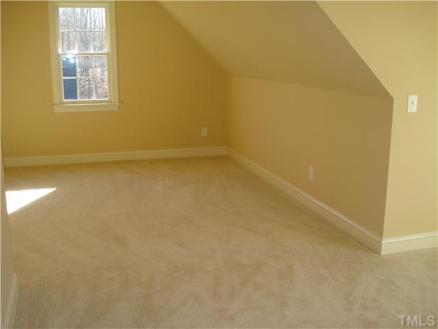 7021 Rippling Stone Lane Raleigh, NC 27612 - Photo 20 of 25 a view of a room with a window