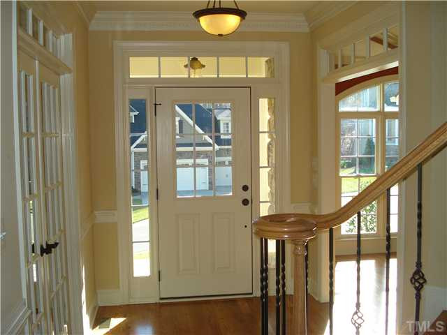 7021 Rippling Stone Lane Raleigh, NC 27612 - Photo 3 of 25 a view of an entryway
