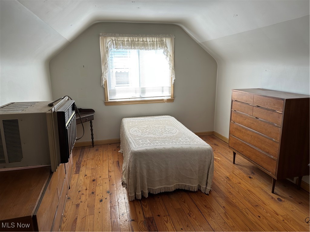 15917 Turney Road Maple Heights, OH 44137 - Photo 11 of 19 Expansive second floor bedroom with beautiful hardwood floors
