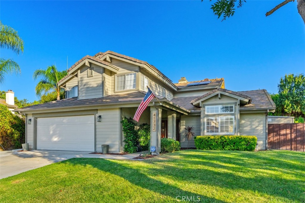 41732 Vía El Greco Temecula, CA 92592 - Photo 1 of 1 a front view of a house with a yard