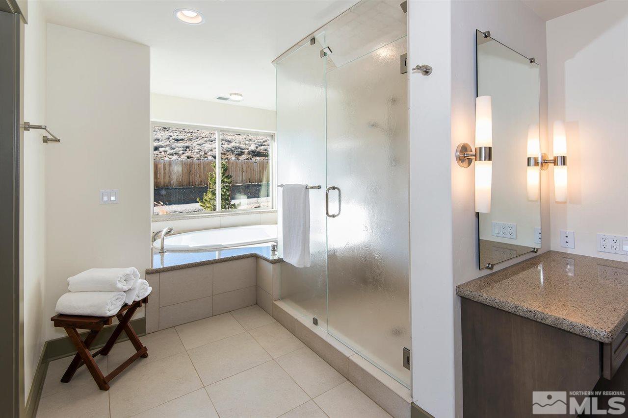 4965 Mason Road Reno, NV 89506 - Photo 17 of 25 a bathroom with a shower and a sink