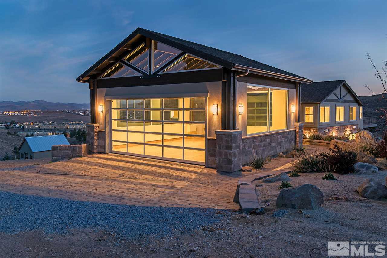 4965 Mason Road Reno, NV 89506 - Photo 3 of 25 a front view of a house with a yard