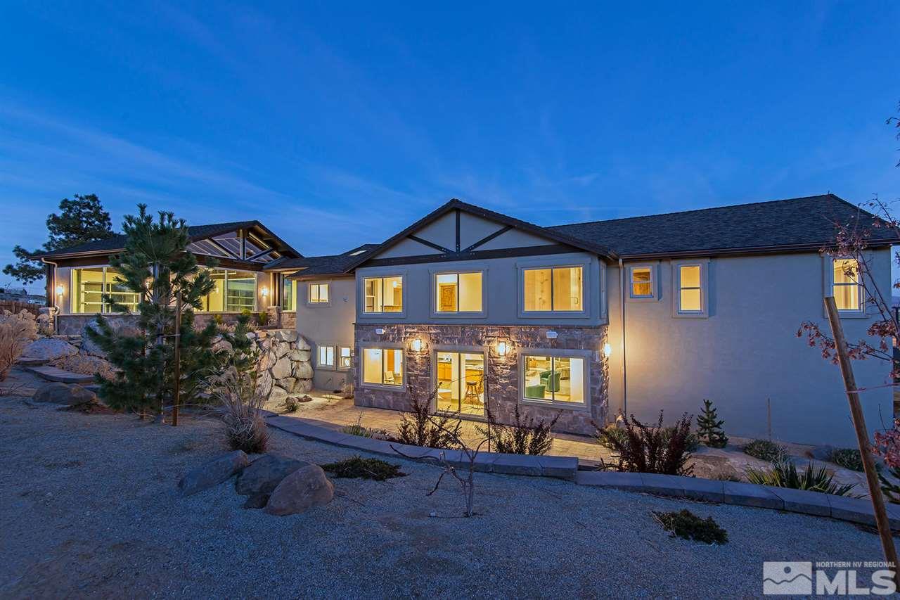 4965 Mason Road Reno, NV 89506 - Photo 4 of 25 a front view of a house with outdoor seating