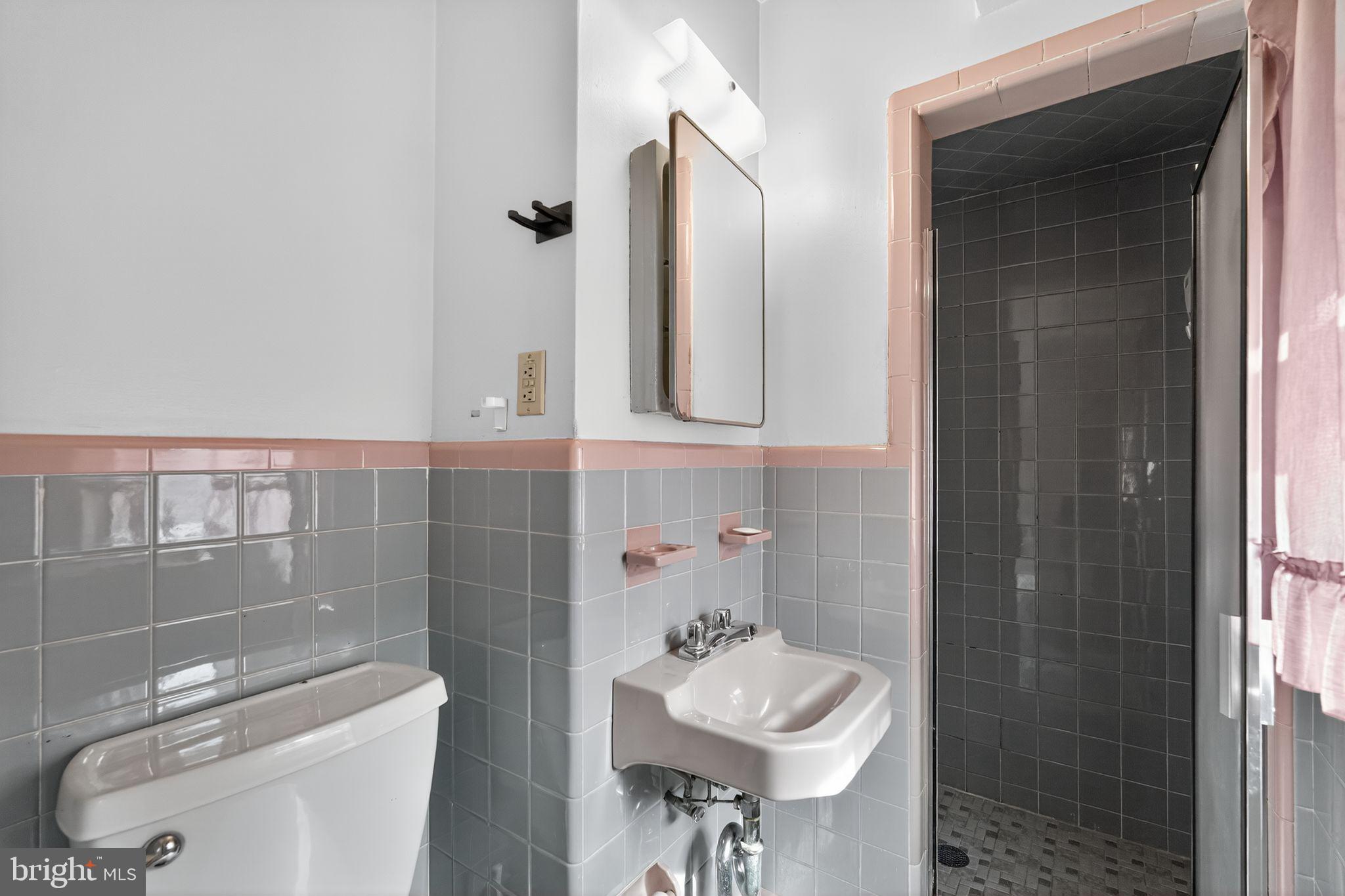 1711 Kendrick Street Philadelphia, PA 19152 - Photo 17 of 29 a bathroom with a sink toilet and shower