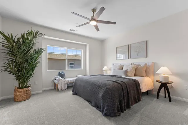 a bed room with bed and a window