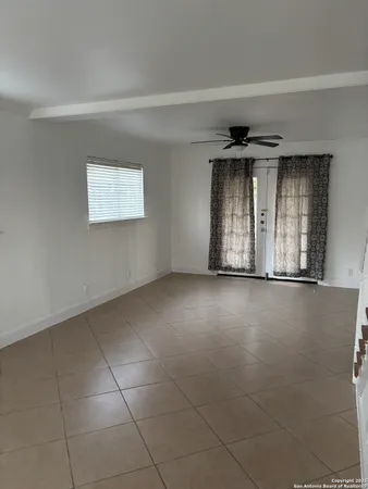 a view of a livingroom with a staircase
