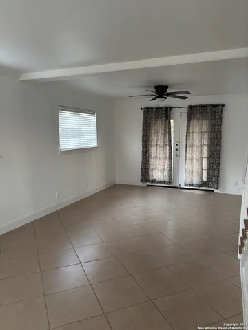 a view of a livingroom with a staircase