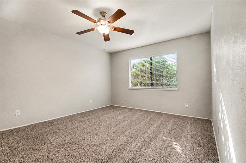 6532 Blue Ridge Trail Plano, TX 75023 - Photo 21 of 25 an empty room with a window