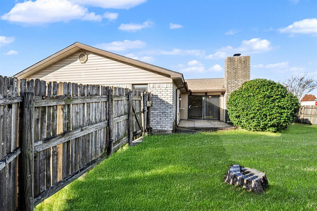 6532 Blue Ridge Trail Plano, TX 75023 - Photo 23 of 25 a view of a house with backyard and garden