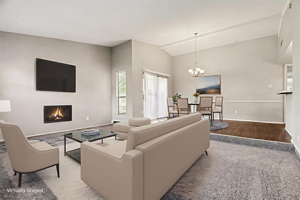 6532 Blue Ridge Trail Plano, TX 75023 - Photo 8 of 25 a living room with furniture and a fireplace