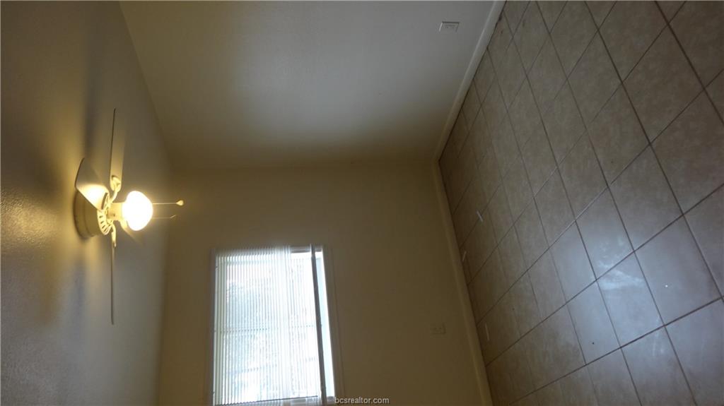 510 Avondale Avenue, Unit 2 Bryan, TX 77802 - Photo 10 of 13 a view of an empty room with a window
