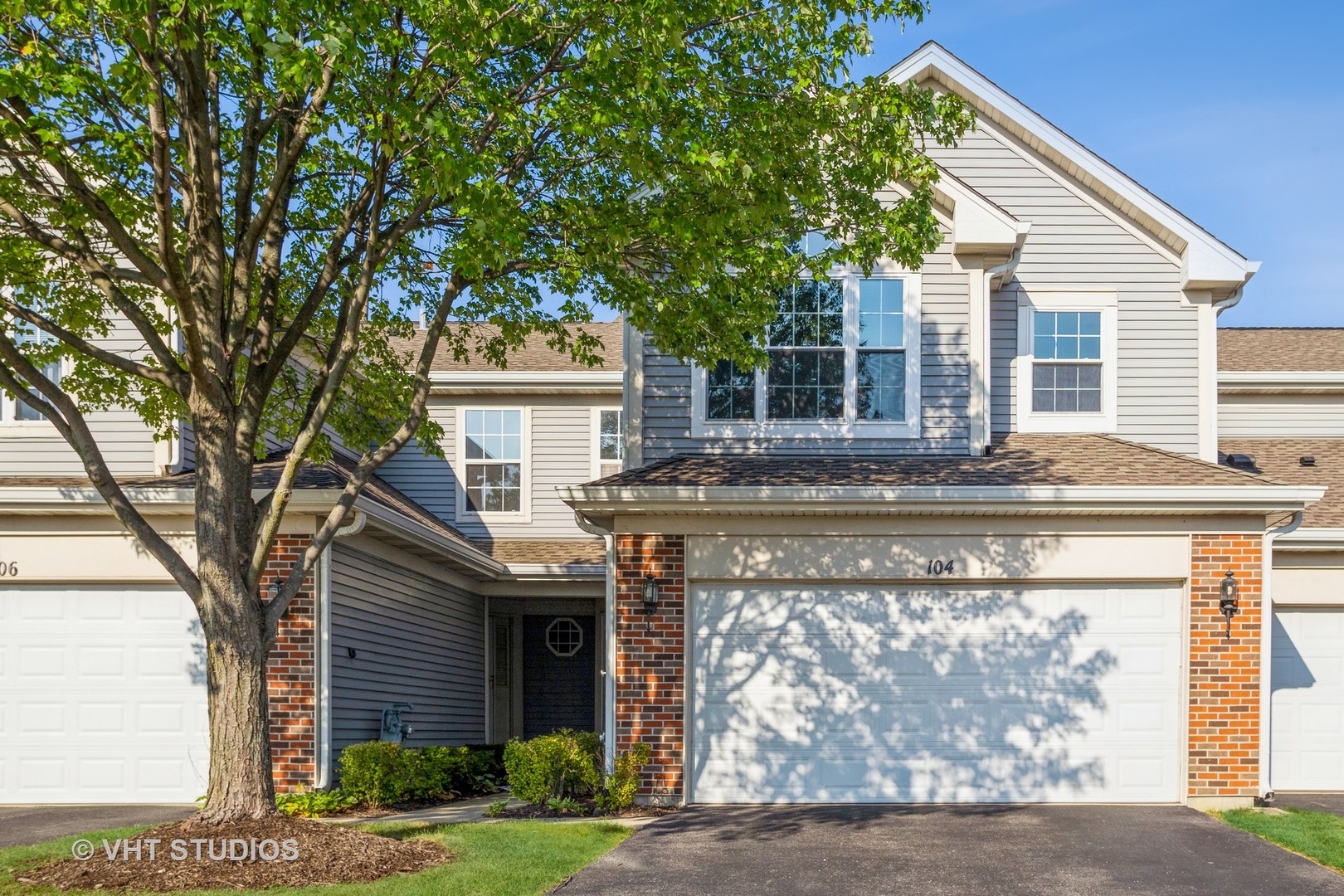104 Millers Crossing Itasca, IL 60143 - Photo 1 of 11 a front view of house with yard