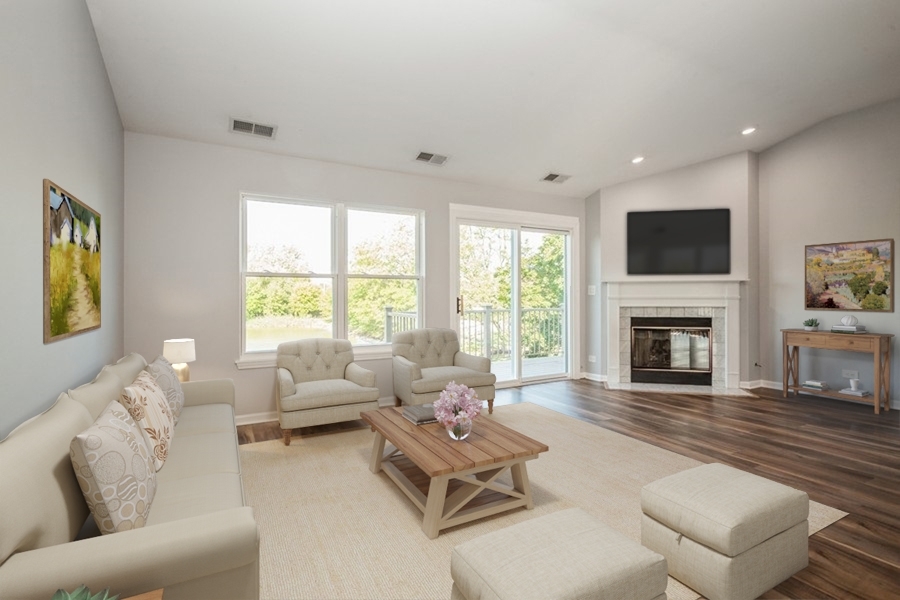 104 Millers Crossing Itasca, IL 60143 - Photo 2 of 11 a living room with furniture fireplace and a flat screen tv