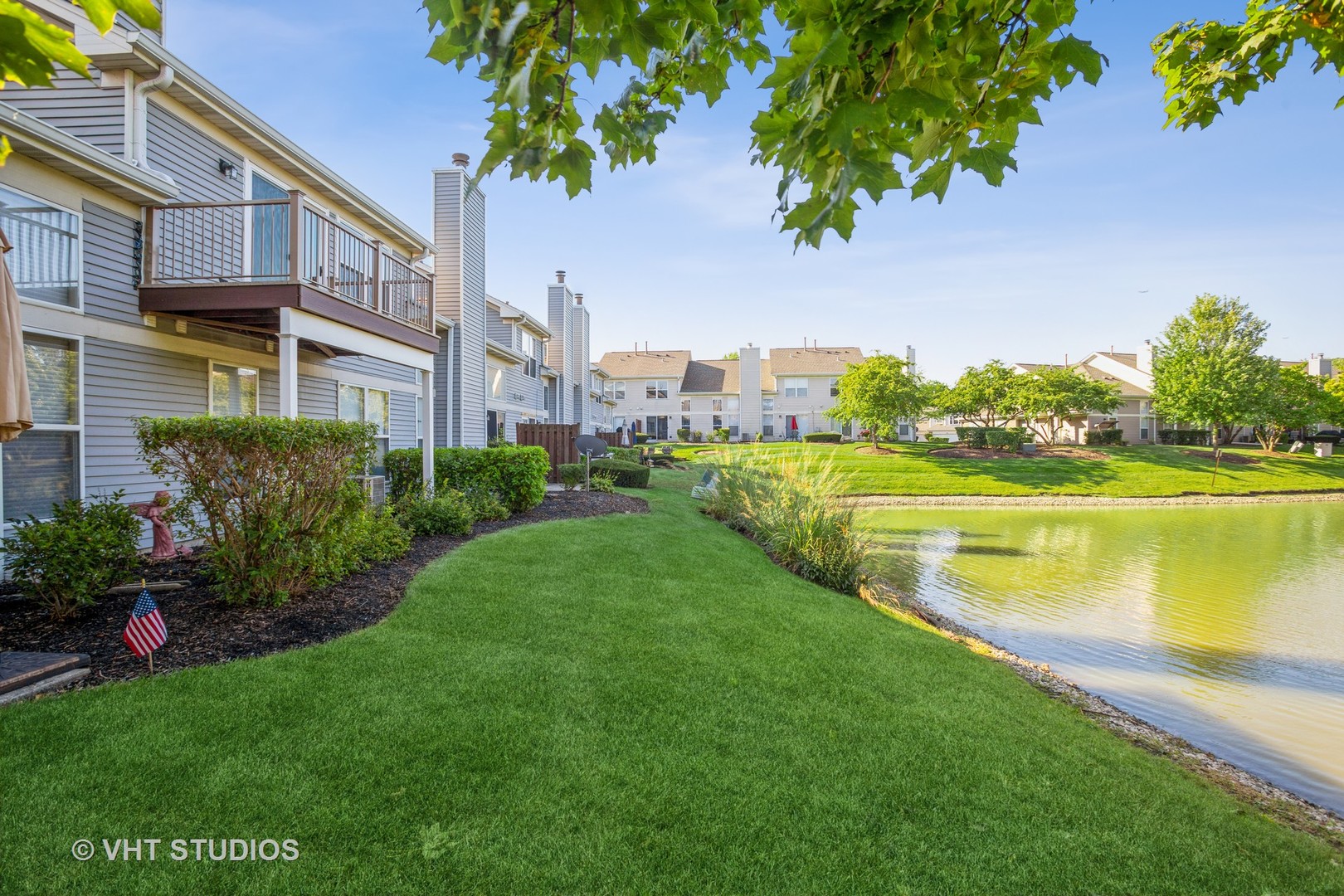 104 Millers Crossing Itasca, IL 60143 - Photo 11 of 11 a view of a house with a yard and a garden