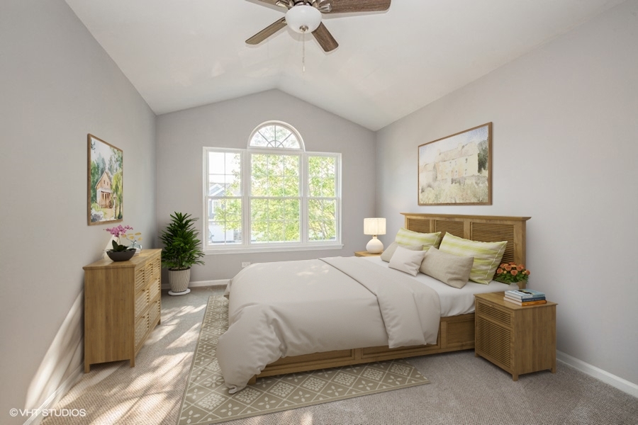 104 Millers Crossing Itasca, IL 60143 - Photo 5 of 11 a large bed sitting in a bedroom next to a window