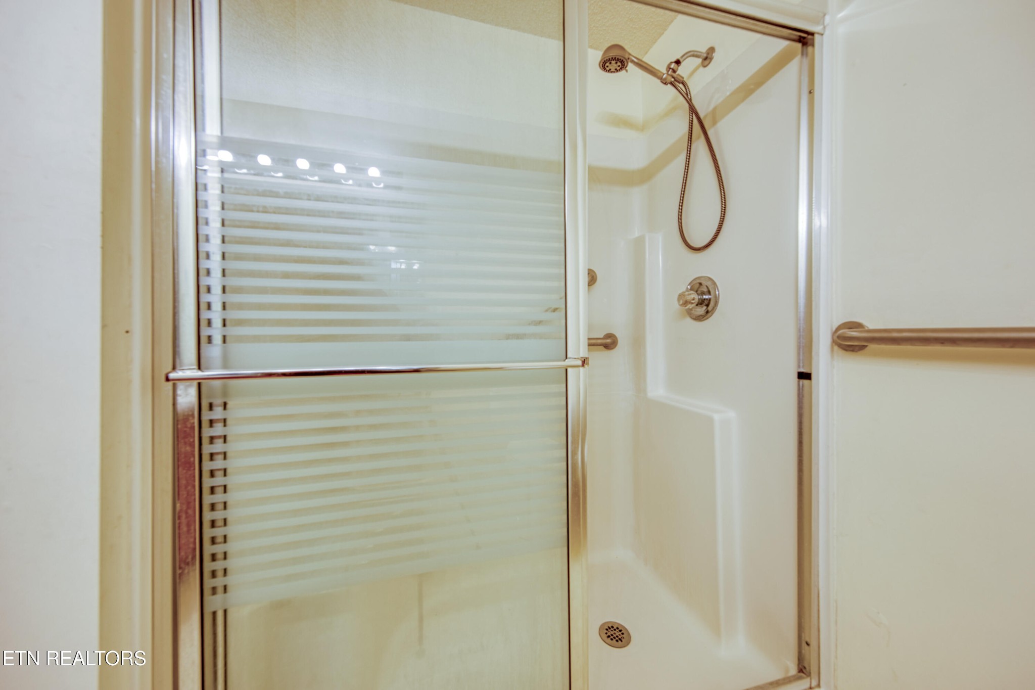 8024 Keybridge Way Powell, TN 37849 - Photo 12 of 23 a bathroom with a shower