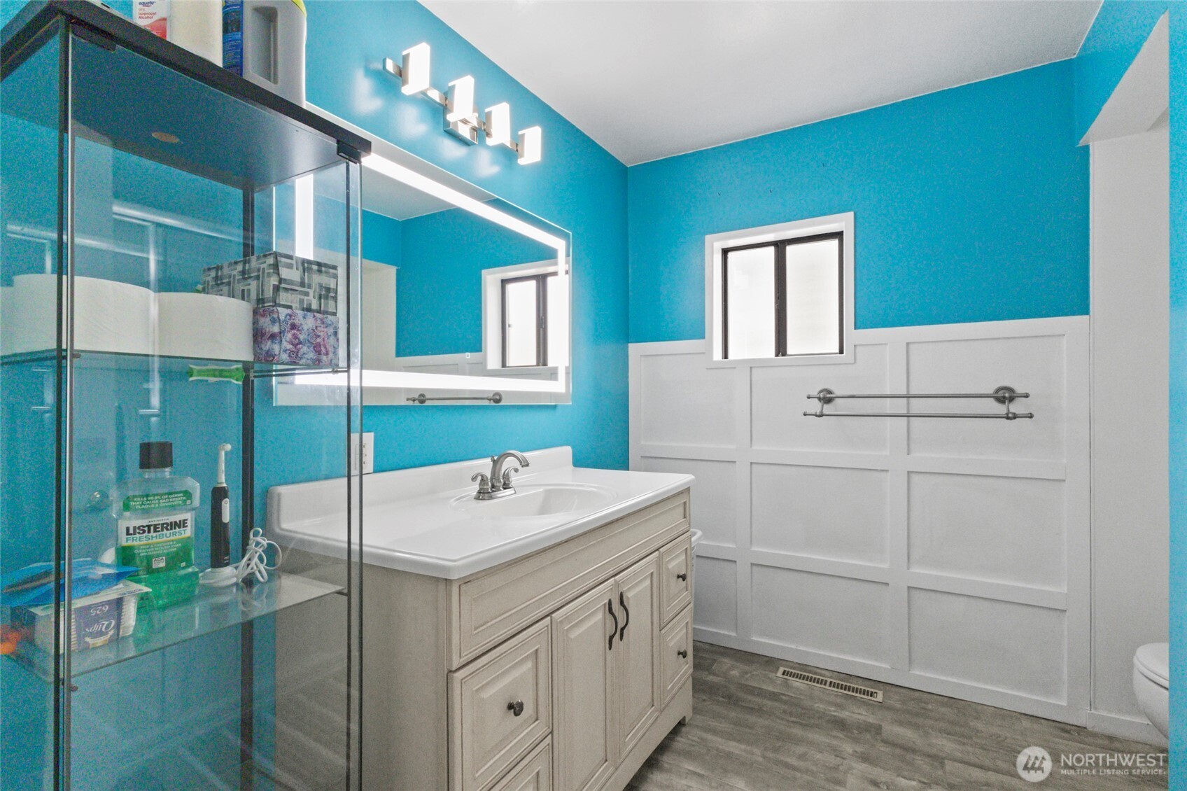 5117 Delaware Avenue Everett, WA 98203 - Photo 14 of 36 a bathroom with a sink and mirror