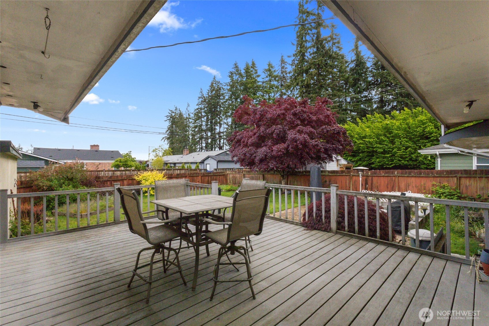 5117 Delaware Avenue Everett, WA 98203 - Photo 20 of 36 a view of balcony with furniture and wooden floor